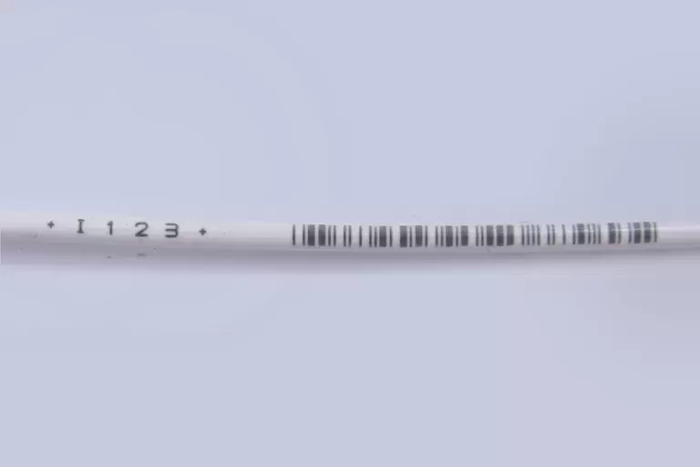 I 1 2 3 Black lines on white colored wrapper.